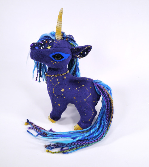 A celestial Unicorn I made is now up for adoption!  :D  I love the hand-painted stars on this one.  