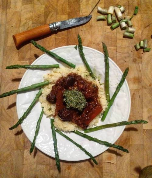 North African Lamb Stew, on couscous with dandelion pesto and asparagus. Overcooked the stew, still 