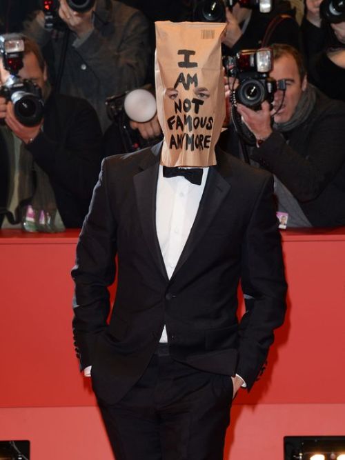 “Shia LaBeouf sports paper bag on head at film premiere”Um.