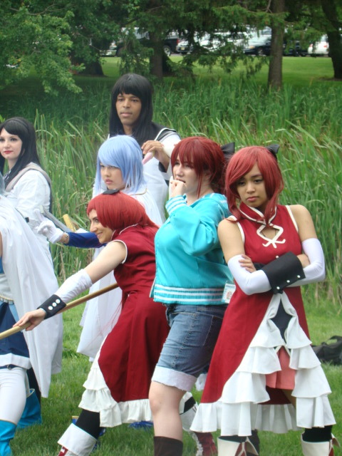 terribletardis:  AnimeNext pics pt2:Madoka photoshoot  Yay!  Pictures of the Kyokos :’)  I’m the one with the spear for most of the pics (as well as my oops face as I’m eating Pocky hah). Also, the Sayaka farthest right is appledress