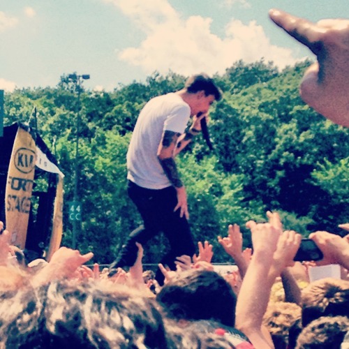 Kyle Pavone of We Came As Romans (my photo, warped 2013)