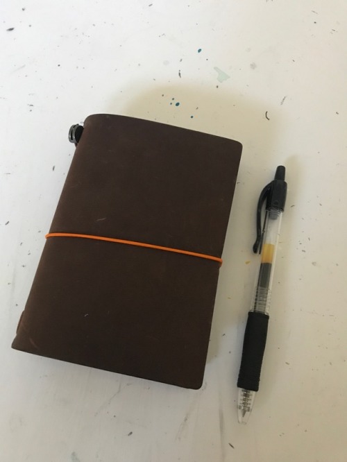 My Midori Passport Traveler’s Notebook! Basically a piece of leather with a strap that allows for cu