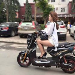 Vietnamese Cutie Riding An Electric Scooter&Amp;Hellip; 