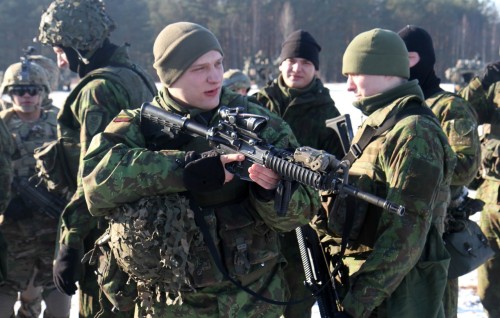 militaryarmament:  Lightning Troop, 3rd Squadron, 2nd Cavalry Regiment get to know the Soldiers and equipment of the Algirdas Battalion, Iron Wolf Brigade, Lithuanian land forces at Rukla, Lithuania, Feb. 2, 2015.
