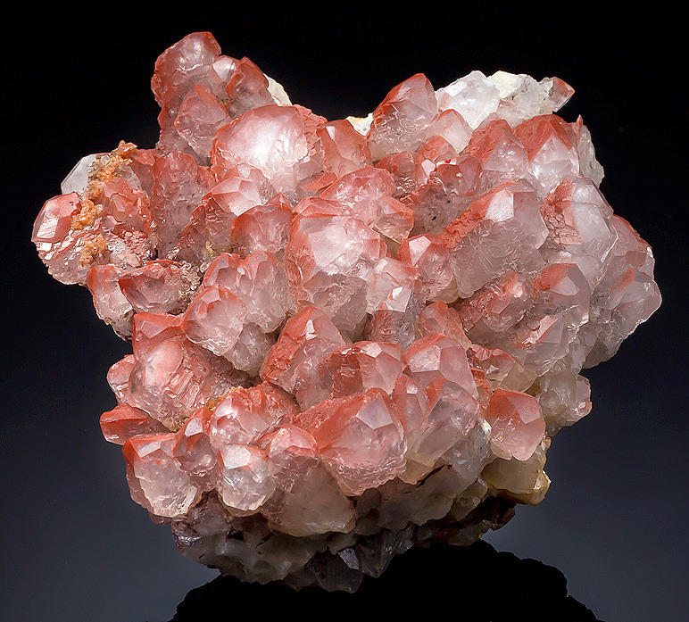 mineralia:  Calcite with Hematite inclusions from Canada by Exceptional Minerals