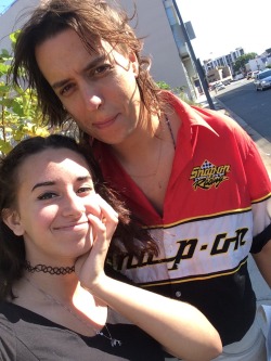 tyrannny:  First i saw him walking down the street before the show and i jumped out of a moving car to say hi, then later on i hopped on his back for the photo 