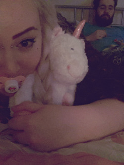 littleprincesschloe:  taking sneaky pictures of daddy whilst I snuggle peep :3
