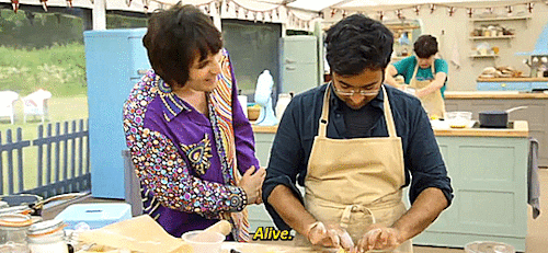 nonbinarywithaknife:ID: Two gifs of Noel and Rahul on Bake Off. In the first, Noel walks up to Rahul