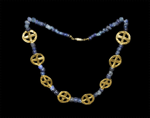 archaicwonder:Western Asiatic Glass and Gold Wheel Element Necklace, Late 1st ML BC