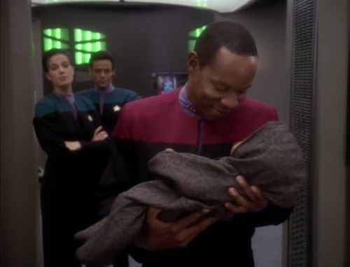 men of star trek having a grand time holding a for real baby