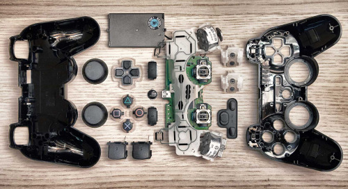 cinemagorgeous:  Many generations of game controllers, taken apart by Brandon Allen. 