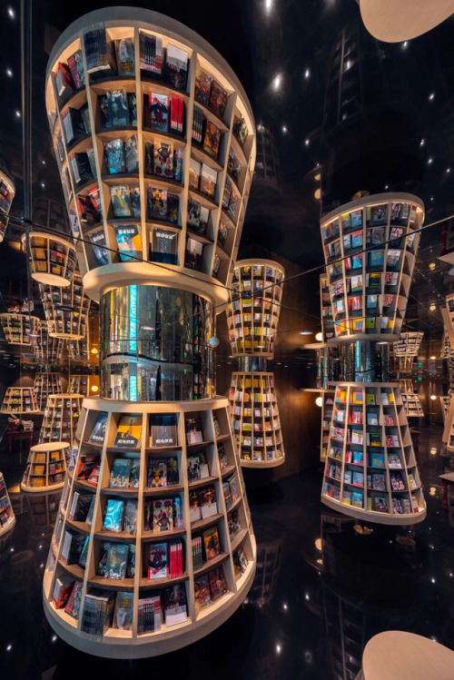 itscolossal:  Mirrored Ceilings and Criss-Crossed Stairwells Give a Chinese Bookstore the Feeling of an M.C. Escher Woodcut