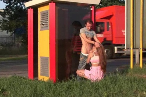 publicsexpictures:Cute chick gives head on the street as traffic drives by.Watch her in this free pu