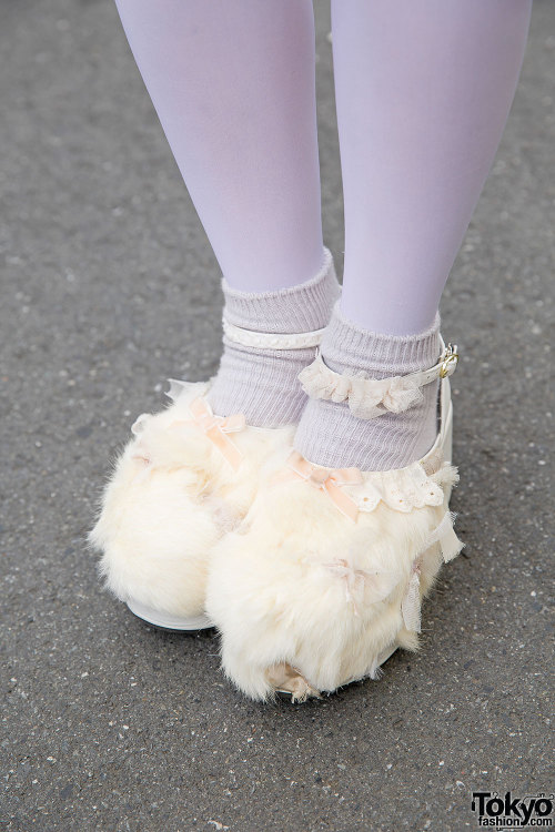 Yumi on the street in Harajuku with cult party kei-inspired makeup, pastel resale/vintage fashion, a