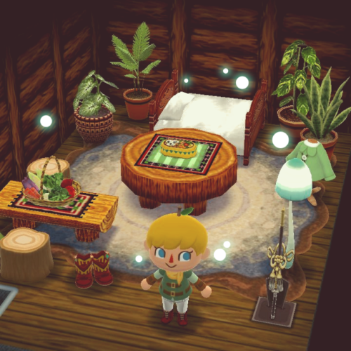 aerial-sword:I finally was able to make my camp TLoZ themed!Outside is BotW, Inside is OoT. I wished