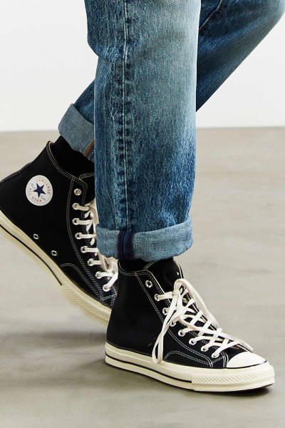 converse and rolled jeans