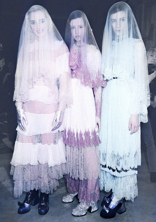 Models wear delicate vintage style pastel dresses with alternating tiers of frothy french lace and s