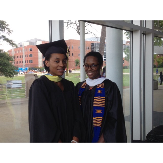 #FlashbackFriday: Amber Covington (#ChesnuttArchives) and LaTasha Jones (#ChesnuttReference) – Staff members dressed in regalia to walk in the academic processional at #FallConvocation on September 4th, 2014. #FBF #ChesnuttLibrary #FayState...