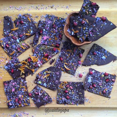 CONFETTI CHOCOLATE BARK with pomegranates, orange zest, ground pistachio & pink/purple coconut. 