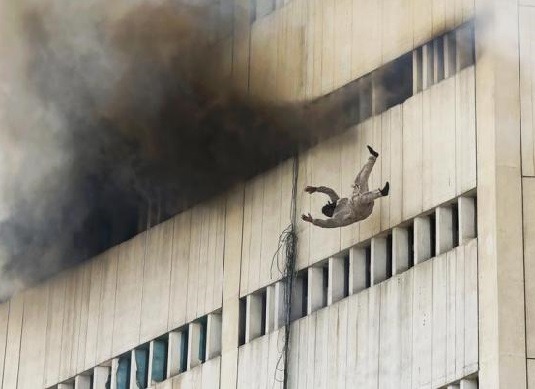 losed: People falling/jumping from a high floor of a burning building in central