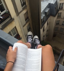 paechly:  reading on rooftops in paris feels like I’m in some kind of movie 