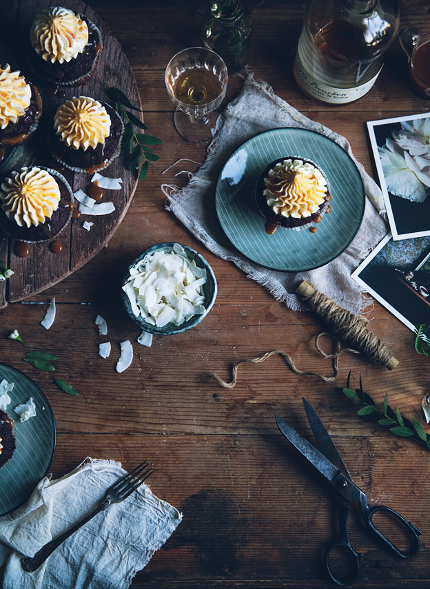 sweetoothgirl:  DOUBLE CHOCOLATE BANANA MUFFINS WITH MASCARPONE FROSTING AND BOURBON