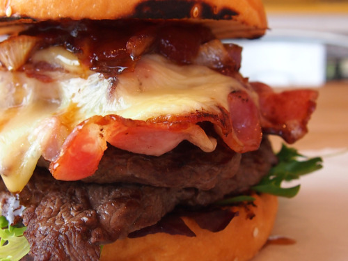 dreamsignite:  the-burger-dude:  bbq’d steak burger with cheddar , bacon , caramelised onion and chipotle bbq sauce.  Sometimes only a burger will do. 