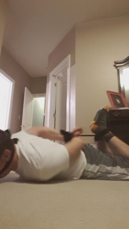 stockingmaskedintruder:  Surprised and overpowered by sexy masked burglar. Hogtied and sockgagged and made to cum  over his socks 