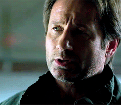 thexfilesgifs:Mulder and Scully telling each other ‘Don’t give up’ in a parking garage in Season Two