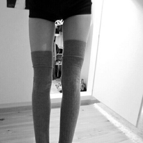 nicotineaddictedangel:oversized sweaters and thigh highs are so cute <3