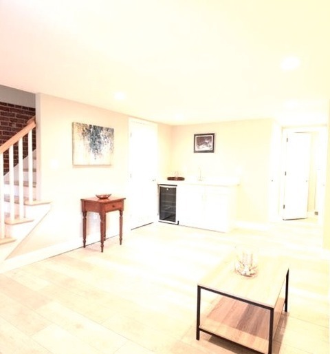 Basement Walk Out DC MetroMid-sized Transitional Walk-out Ceramic Tile And Multicolored Floor Basement