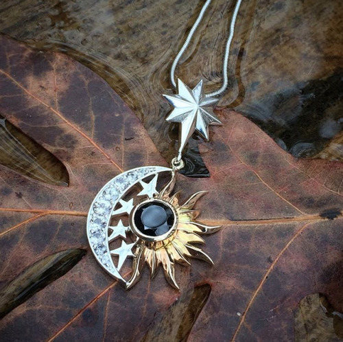 Solar Eclipse pendant - silver, gold, black diamond, leaf, rain….