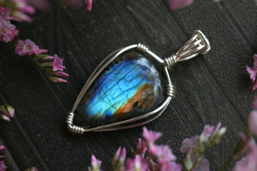 All these beautiful wire wrapped sterling silver labradorite pendants are available at my Etsy Shop 