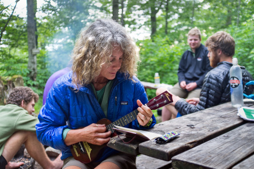 GI Joe, a Vermont Long Trail end-to-ender, playing her ukulele at Story Spring Shelter in Vermont.