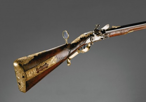 Ornate flintlock rifle owned by Holy Roman Emperor Charles VI, crafted by Caspar Zellner in 1730.  A