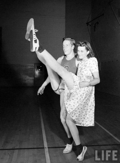 High jumper Les Steers demonstrates his kick(Hansel Mieth. 1941)
