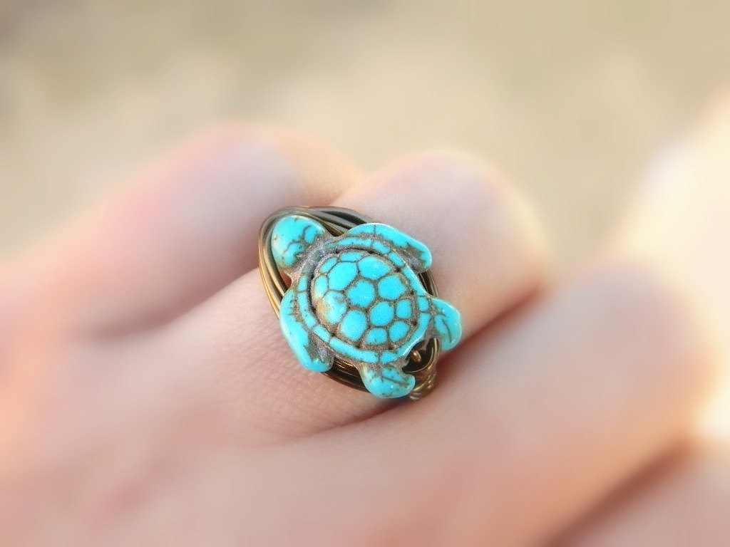 wickedclothes:  Turquoise Turtle Ring Crafted out of turquoise, this turtle is attached