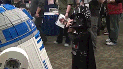 squiglet:  geekdandy:  bookoisseur:  kissmyasajj:  sizvideos:  Little girl dressed as Darth Vader is scaring R2-D2 - Video  I almost cried this is too cute.  omg  This girl just used Force Choke on my heart.   Had to blog omg