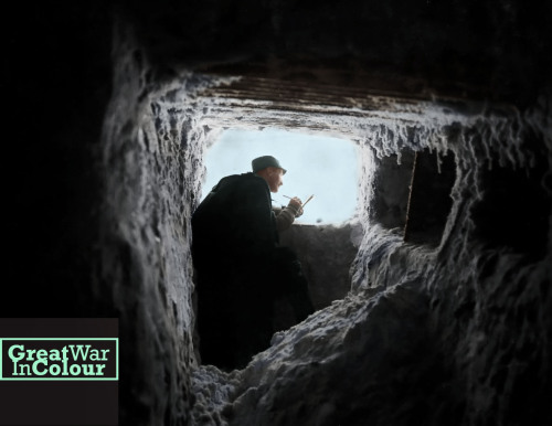 Austrian war painter Lieutenant Kainradl at work in a snow tunnel on the Italian Front, circa 1916.O