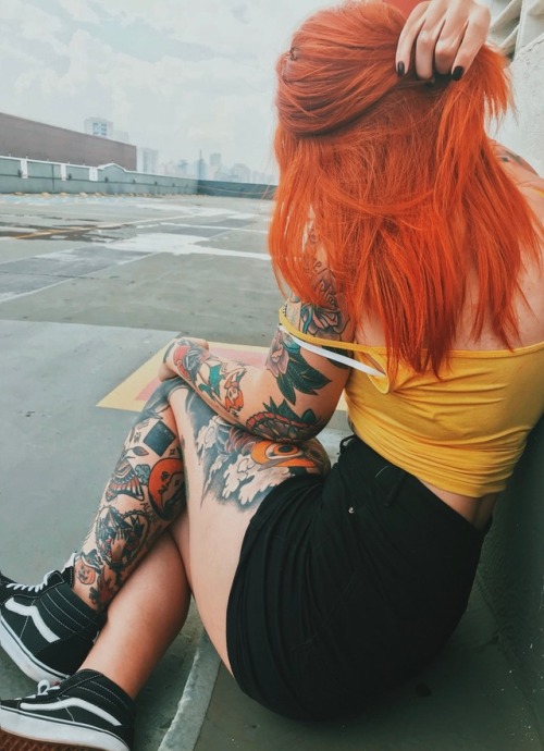 tattooed redhead