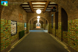 In the hall the brickwork is partly glazed.