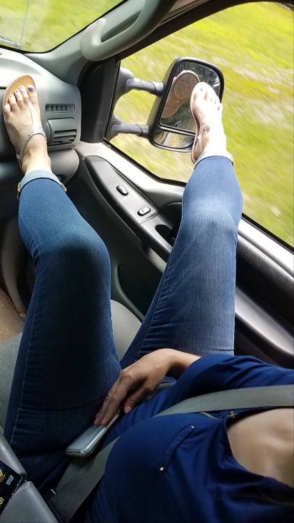 My pretty wifes sexy feet and curves looking very nice in the truck.please comment