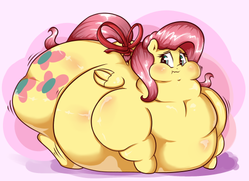 khaoskris:  Barely able to waddle in the room, Fluttershy blushed as she dragged her belly over to the bed. Her large, soft belly gurgled and glorped, still feeling the effects of her most recent meal. Fluttershy’s whole body jiggled with each pathetic