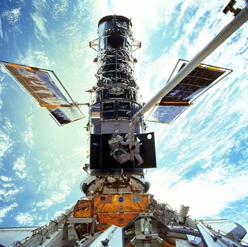 NASA astronauts Steven Smith & John Grunsfeld servicing the Hubble Space Telescope, December 199