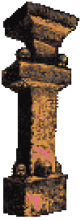 pixelated graphic of a pillar with skulls on it