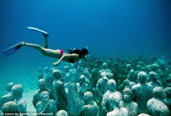 A little surprise for you off the coast of Cancun  http://wonderousworld.com/mexico/playa-del-carmen/playa-del-carmen-tours/ I wanna go there