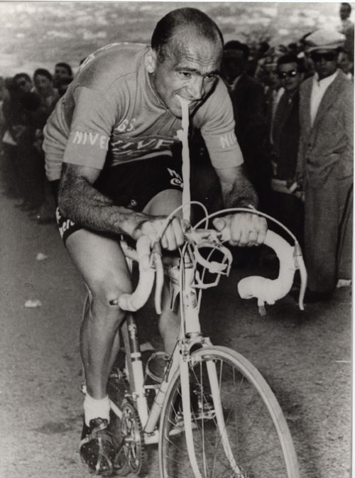 classicvintagecycling: Giro d'Italia, 1956. Fiorenzo Magni, riding with a broken collarbone after a 