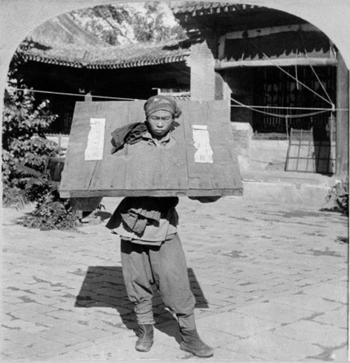 Chinese “"Boxer” imprisoned in Beijing, ca. 1900