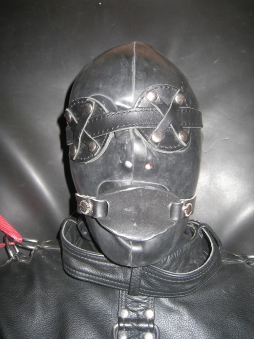 northernleather:A gimp restrained
