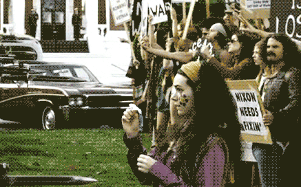 hippist:  oliviatheelf:  hippieseurope:  ☮❤☮❤  I wish someone would make the entire gif for this clip. The one where it shows her putting the flower in the gun, stepping back, and then being shot to death. It symbolizes the Kent State University